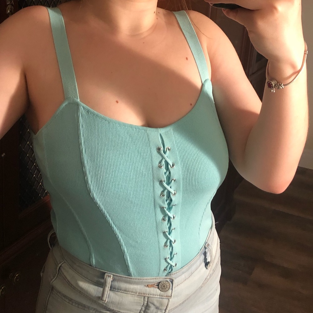 Baby blue tank top with zig zag pattern